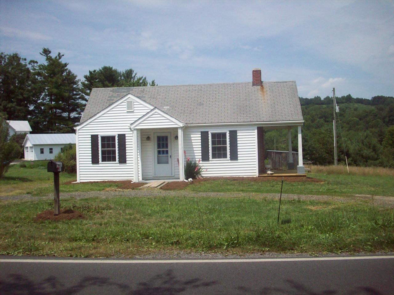 159 Conner Grove Road Southwest Willis, VA 24380 - Photo 2 of 5 a front view of a house with a yard