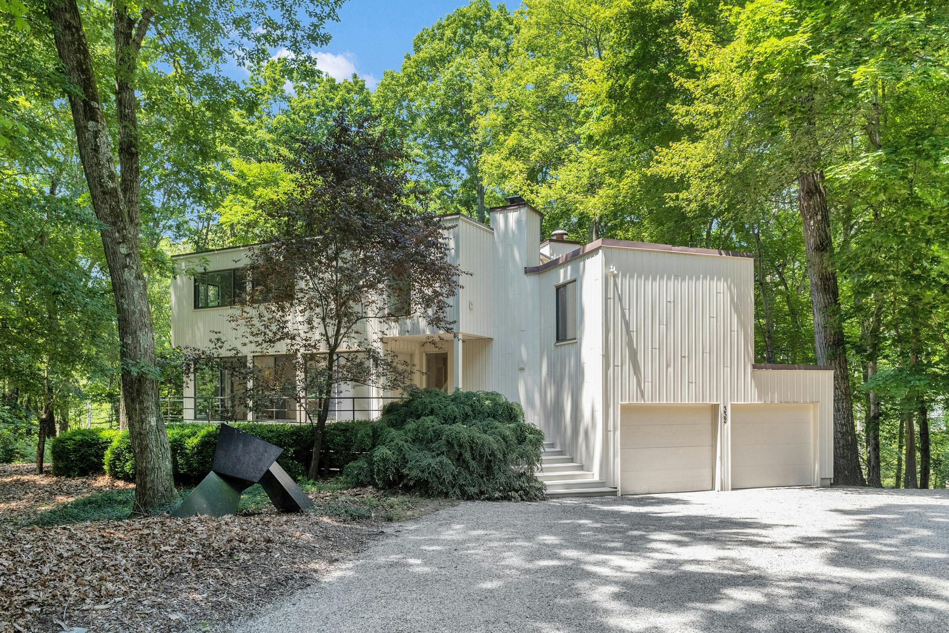 332 Mill Road Stamford, CT 06903 - Photo 1 of 1 a front view of a house with a yard