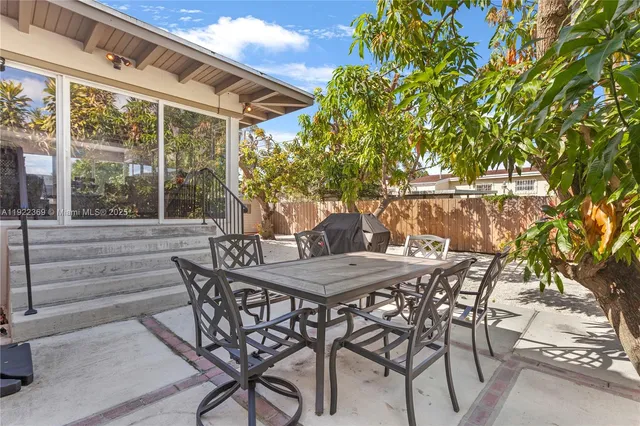 a view of an outdoor space with furniture