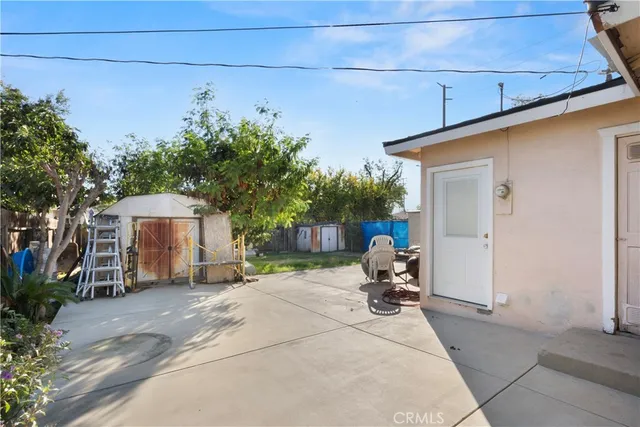 a view of a car park in front of house