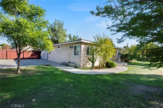 an aerial view of residential house and green space