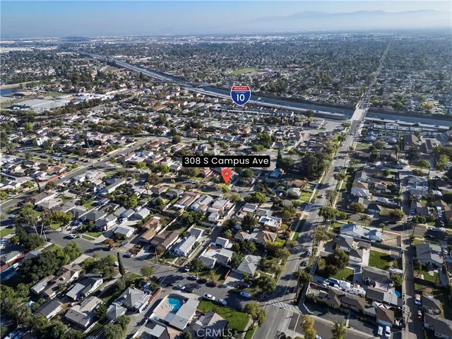 an aerial view of residential house with outdoor space