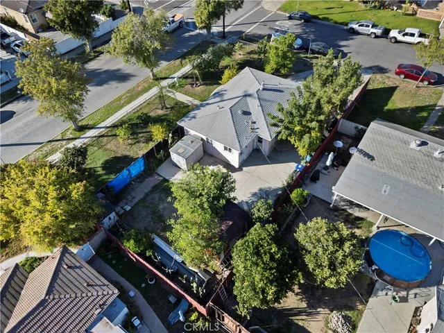 an aerial view of residential house with outdoor space
