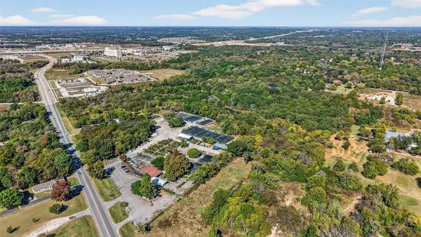 a view of a yard with an outdoor space