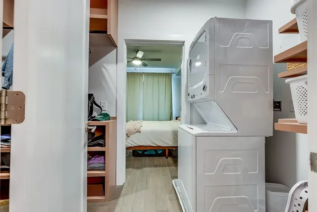 a bed room with a bed and a cabinets