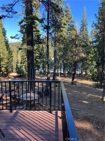 a table and chairs with the view of the deck