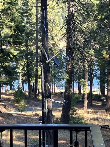a view of balcony with furniture and wooden deck