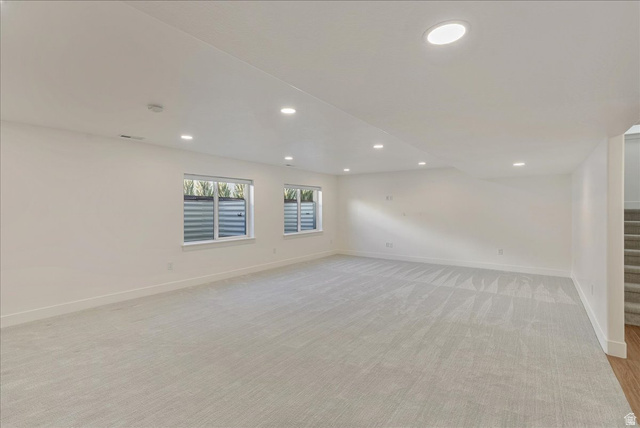 882 Spring Dew Lane Lehi, UT 84048 - Photo 41 of 46 Unfurnished room with recessed lighting and light carpet