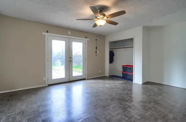 a view of an empty room with a window