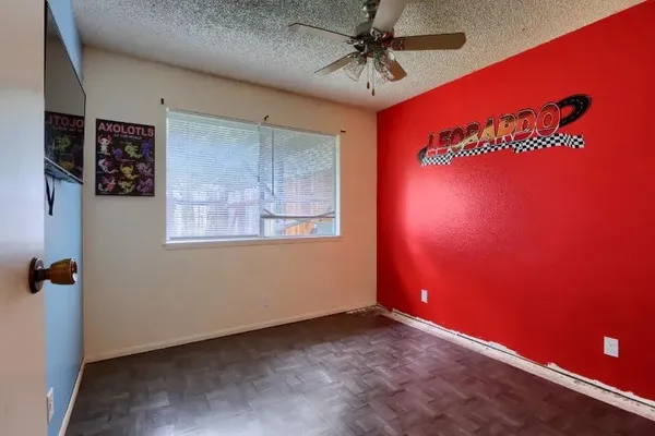 a view of a livingroom with wooden floor