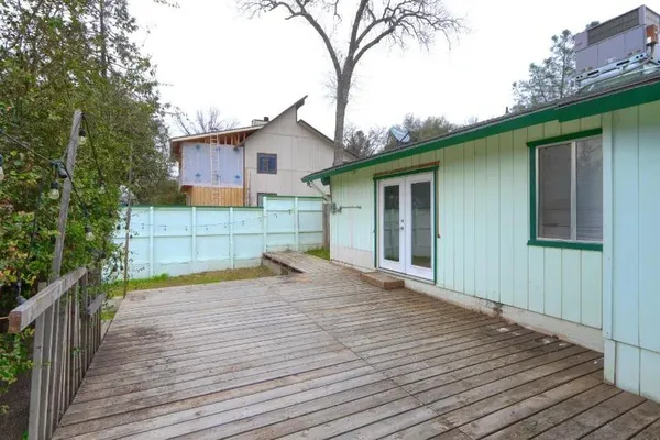 a view of a house with a deck