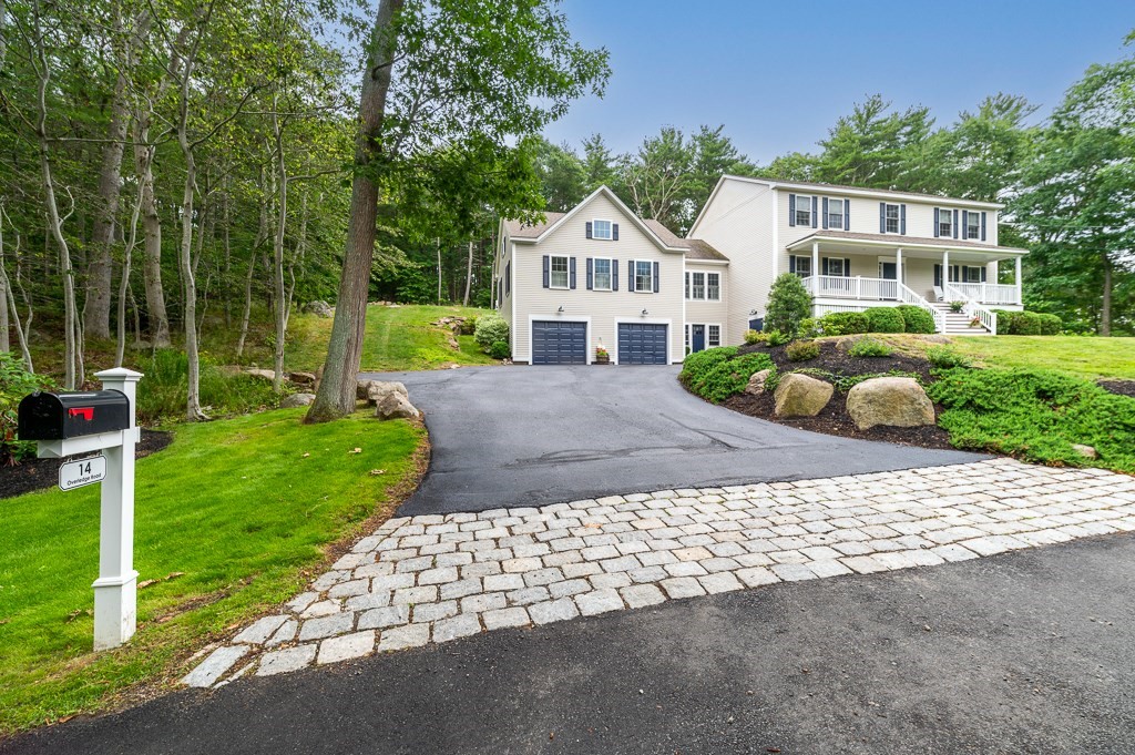 14 Overledge Road Manchester, MA 01944 - Photo 1 of 36 a front view of a house with garden