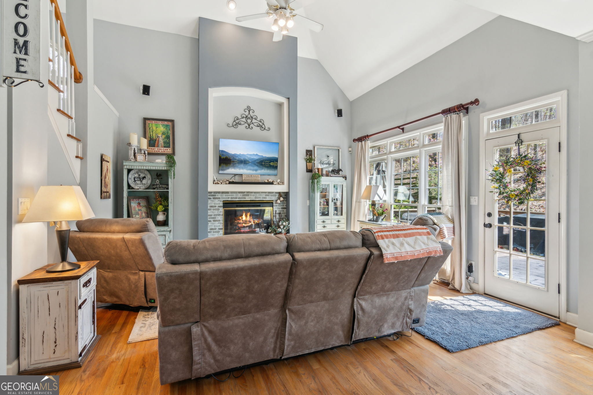 5388 Frazer Road Buford, GA 30518 - Photo 11 of 100 a living room with furniture and a fireplace