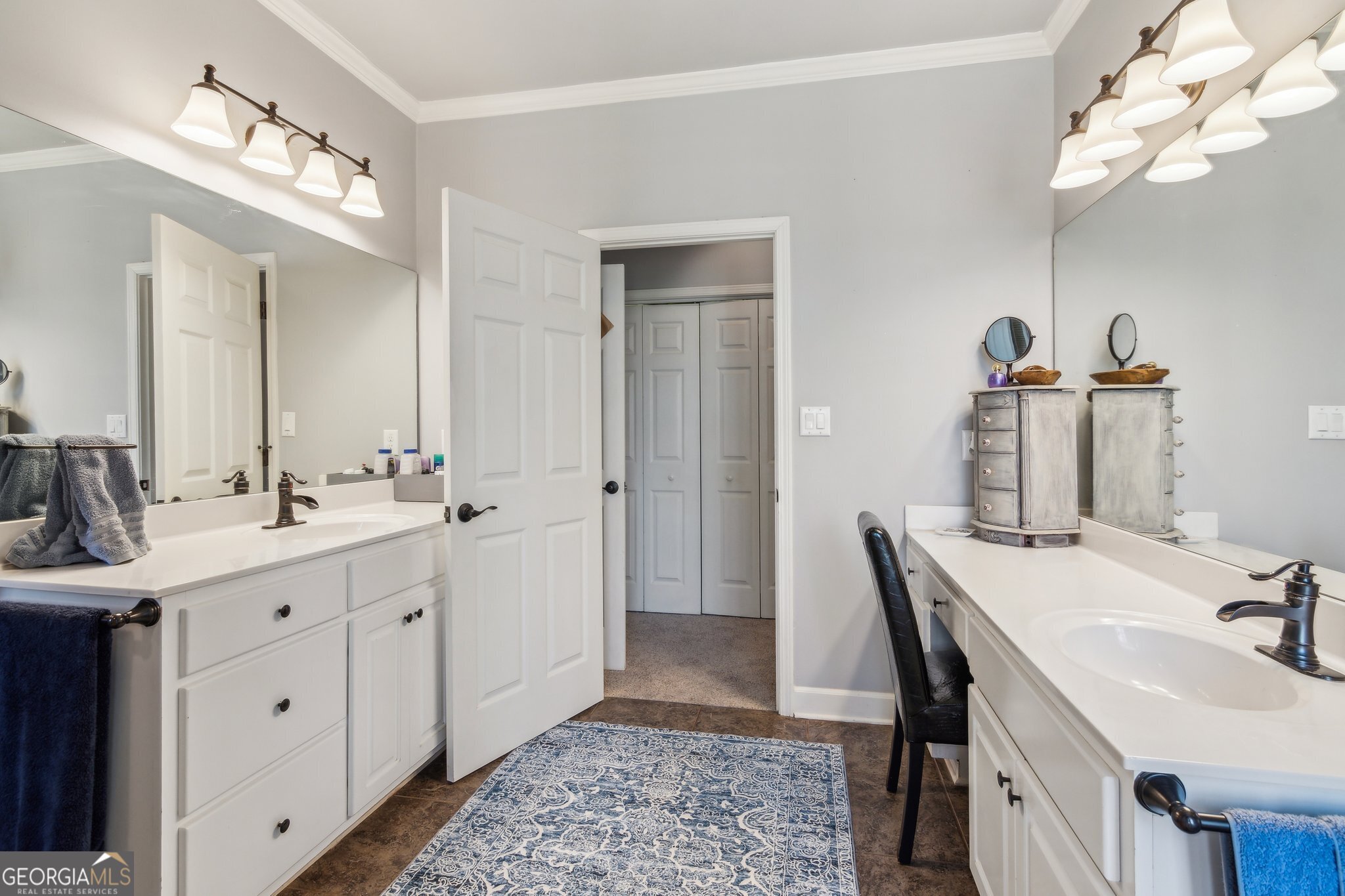 5388 Frazer Road Buford, GA 30518 - Photo 25 of 100 a en suite bathroom with a double vanity sink and a mirror