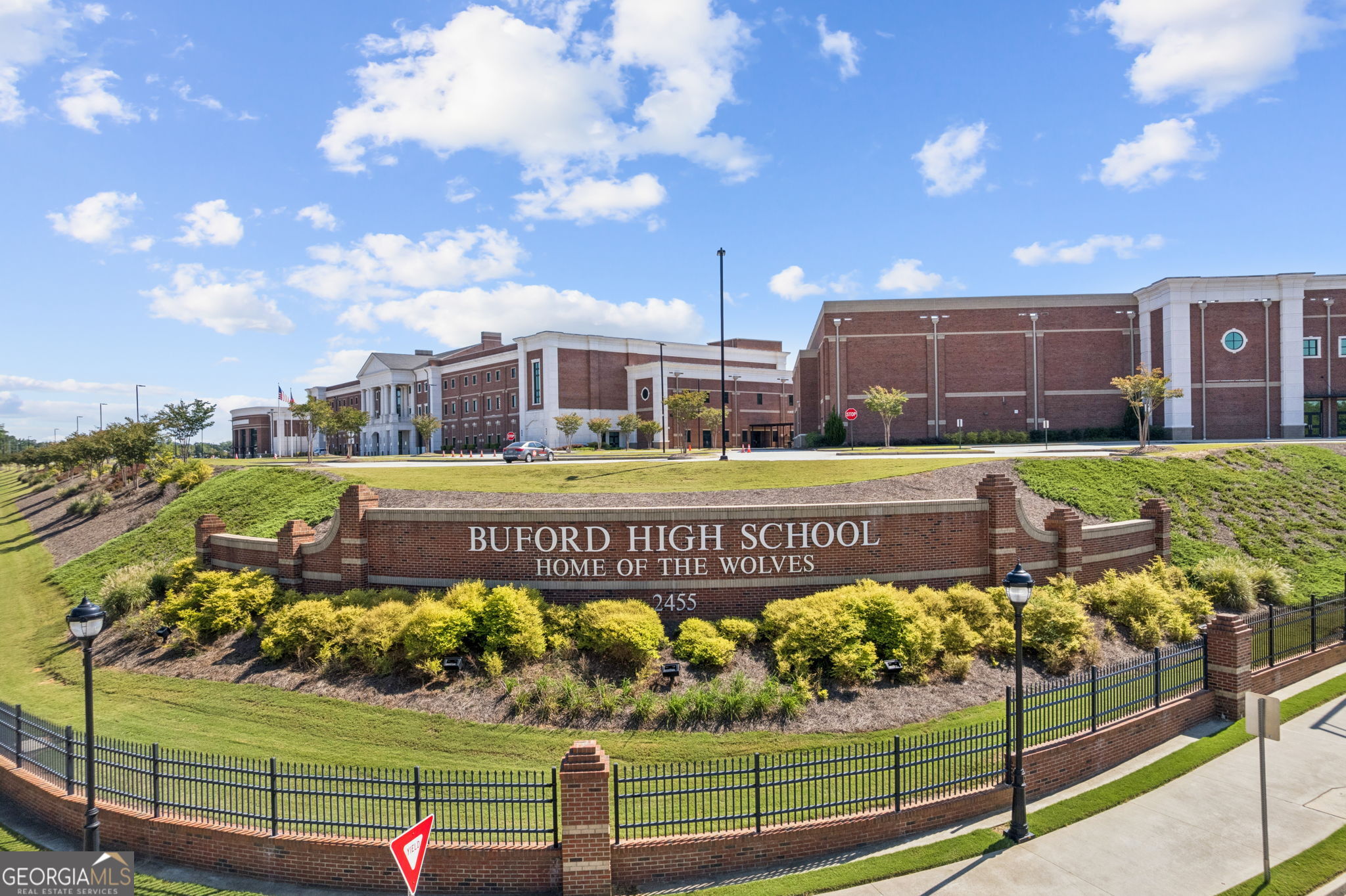 5388 Frazer Road Buford, GA 30518 - Photo 90 of 100 a front view of a house with a garden
