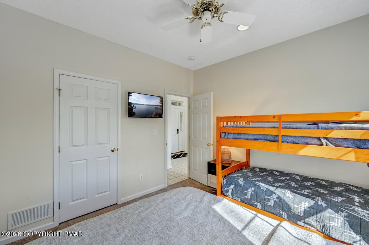 355 Windy Bush Road Long Pond, PA 18334 - Photo 19 of 39 Main Level Bedroom