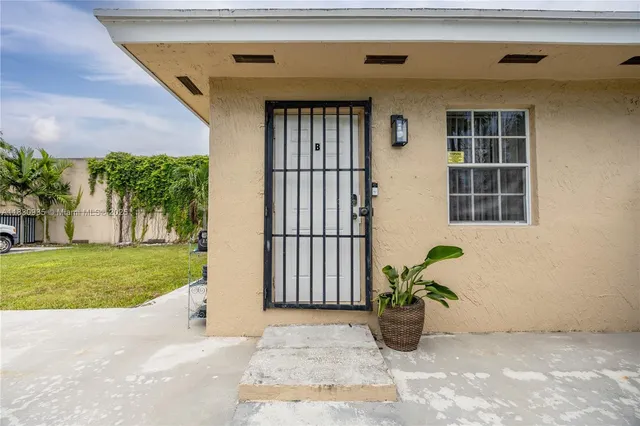 a room with a stove and a table