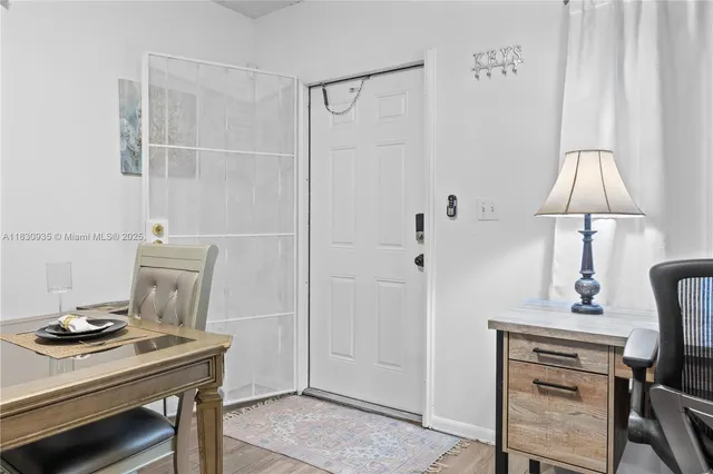 a workspace with furniture and wooden floor