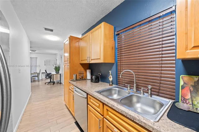 a view of a workspace with furniture and a livingroom