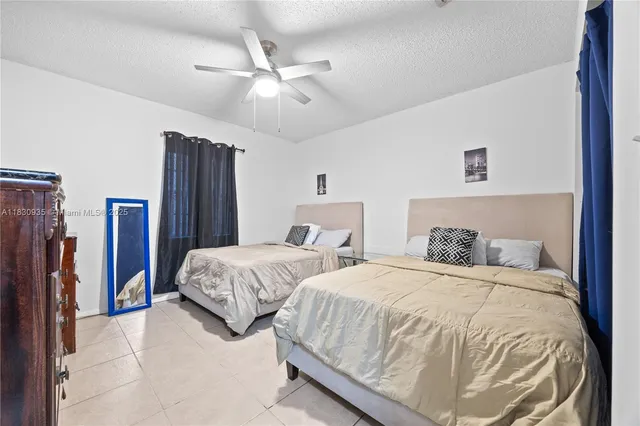 a bedroom with a bed and a closet