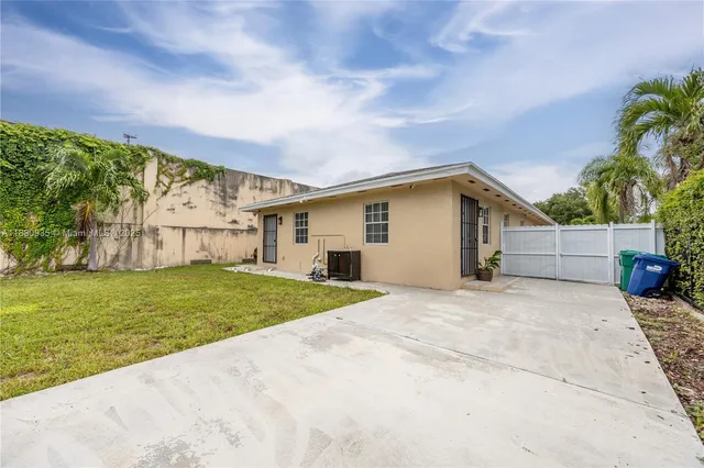 a view of garage and yard