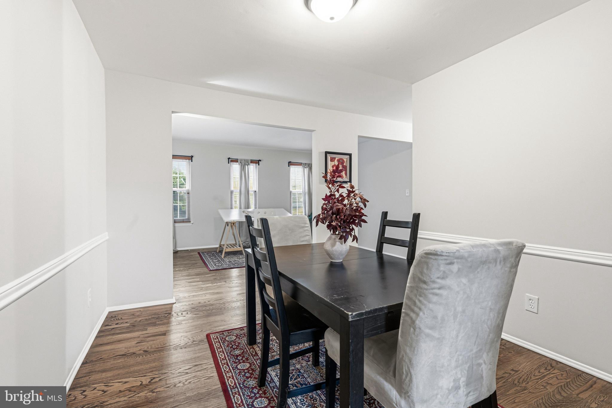 9 Menteith Court Baltimore, MD 21236 - Photo 12 of 46 a view of a dining room with furniture and wooden floor