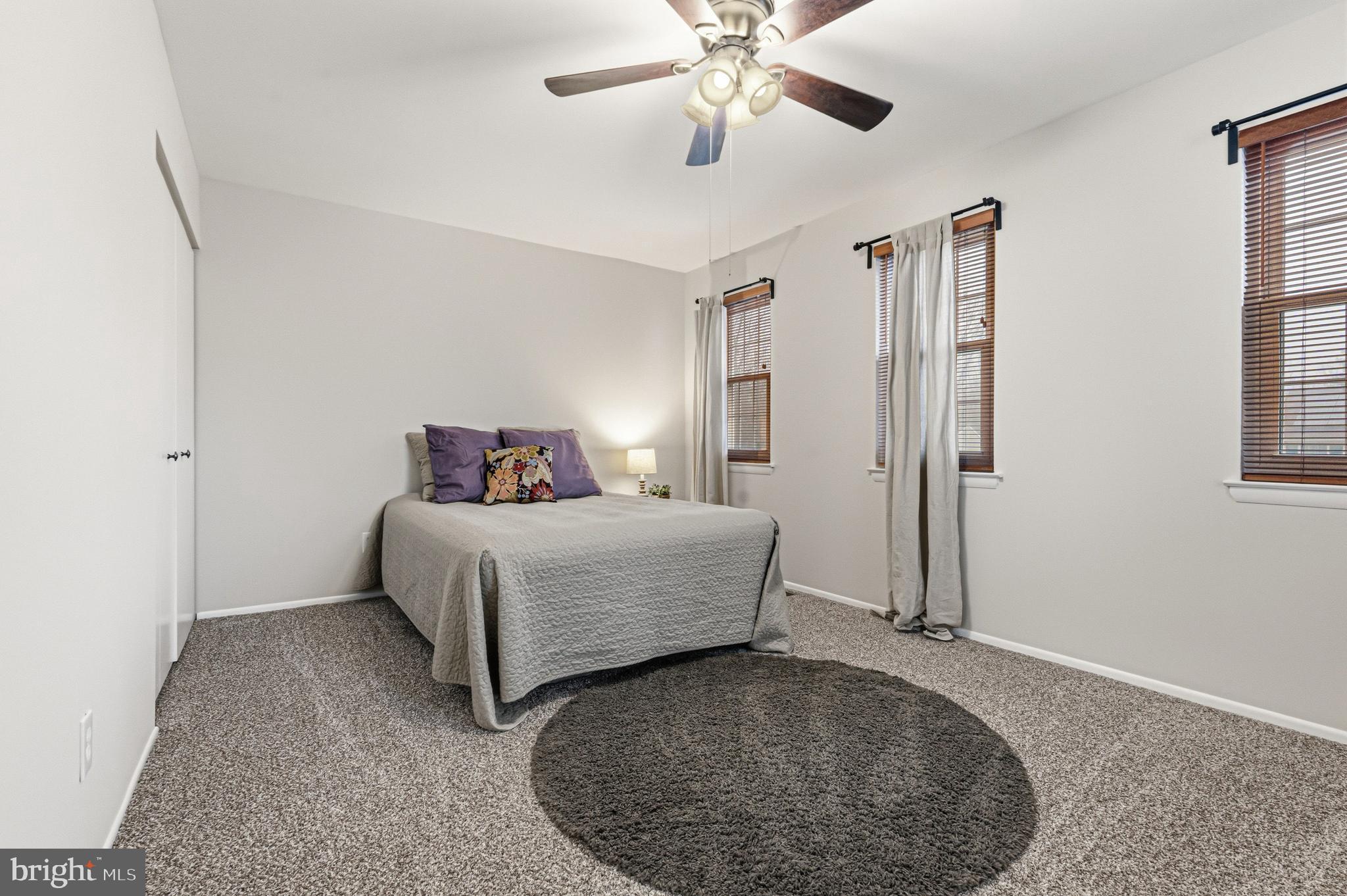 9 Menteith Court Baltimore, MD 21236 - Photo 21 of 46 a bedroom with a bed and a chandelier
