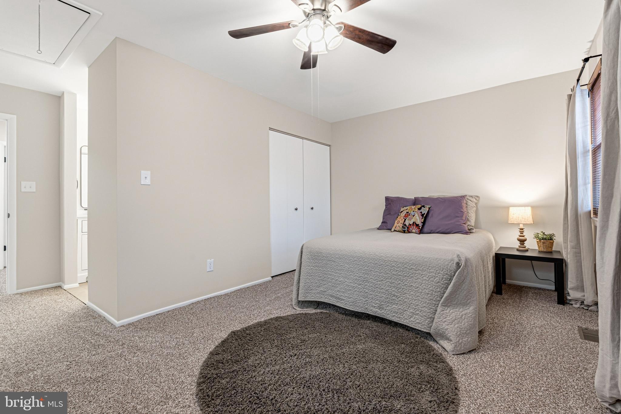 9 Menteith Court Baltimore, MD 21236 - Photo 22 of 46 a bedroom with a bed and ceiling fan