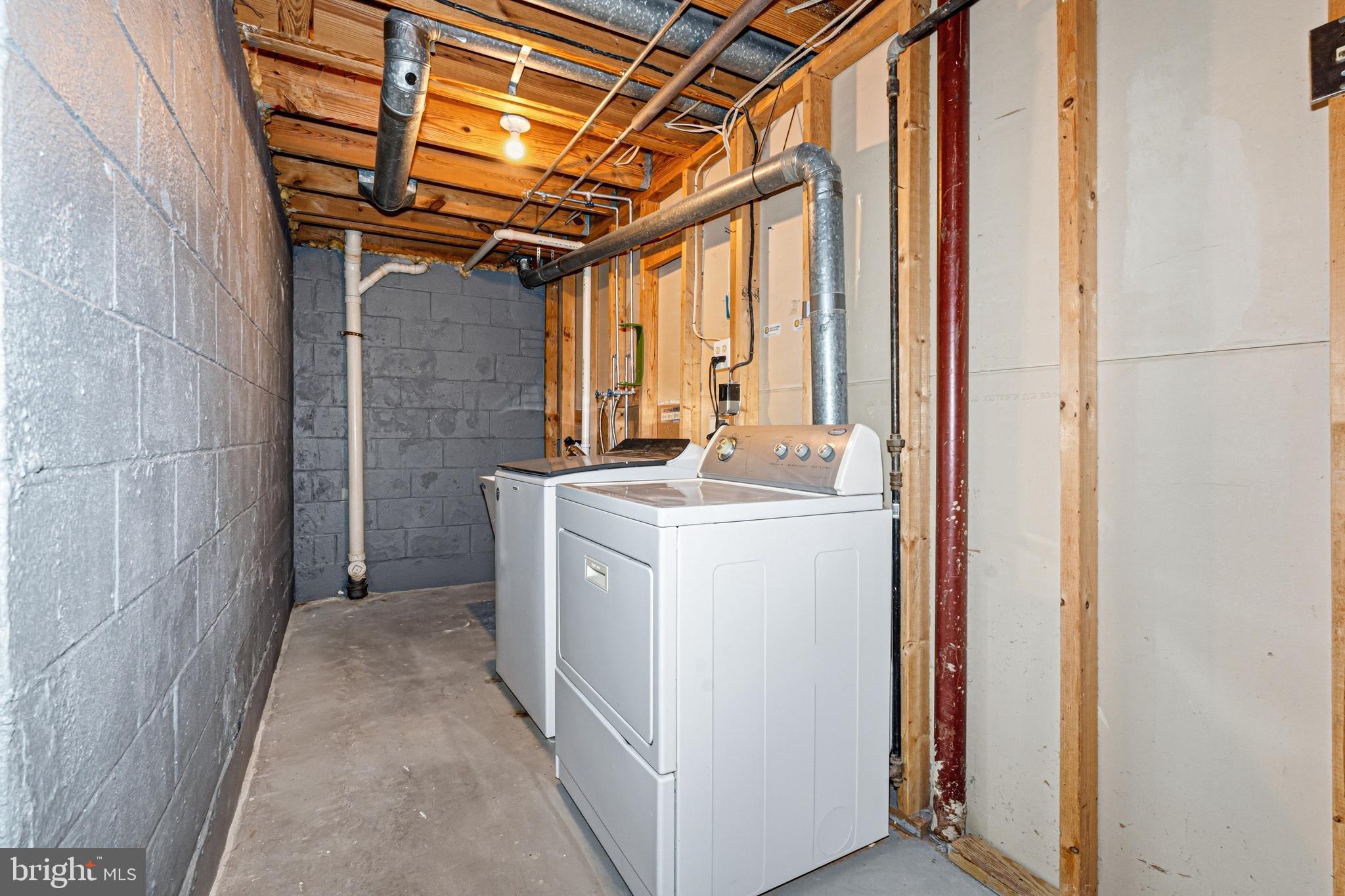 9 Menteith Court Baltimore, MD 21236 - Photo 33 of 46 a utility room with dryer and washer