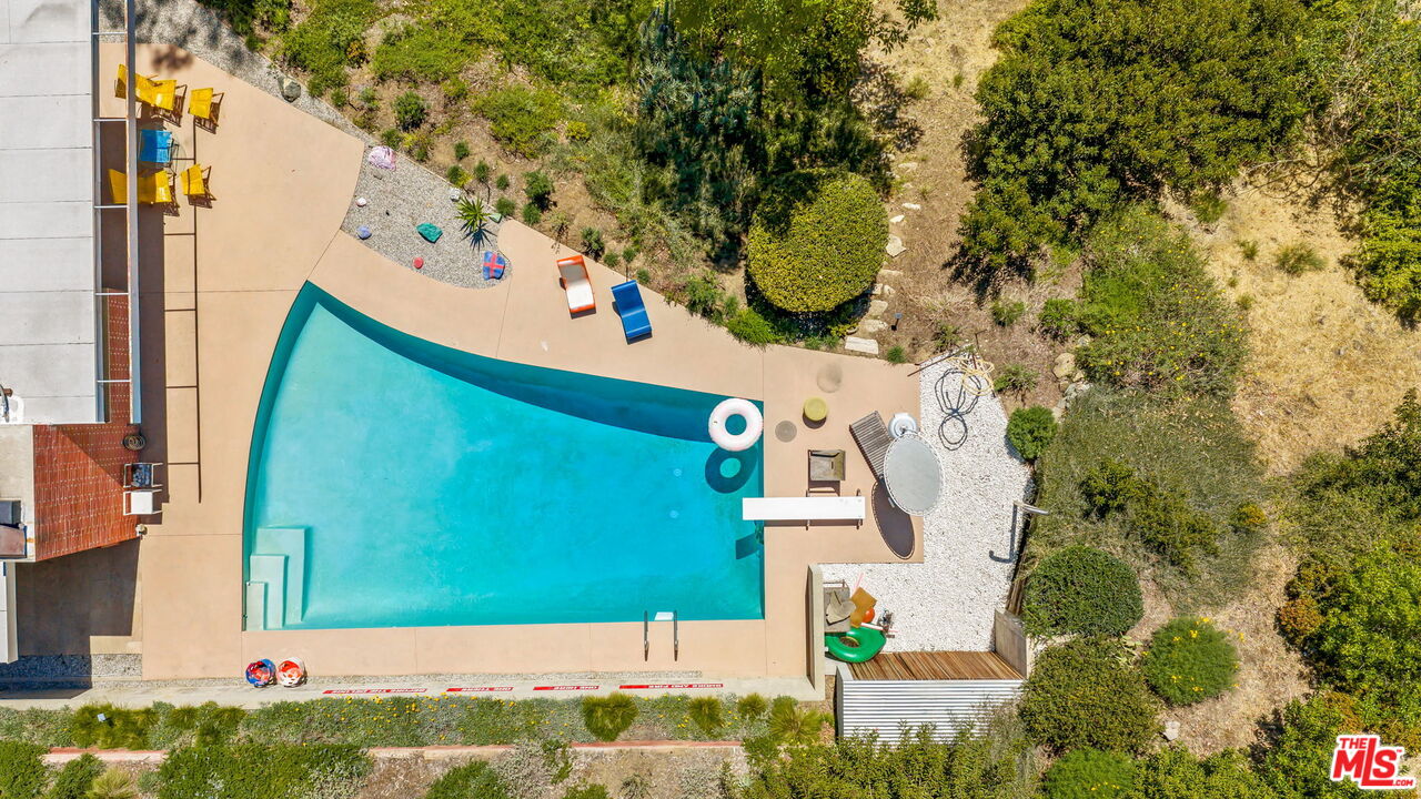 1531 North Tigertail Road Los Angeles, CA 90049 - Photo 2 of 24 an aerial view of a house with a yard