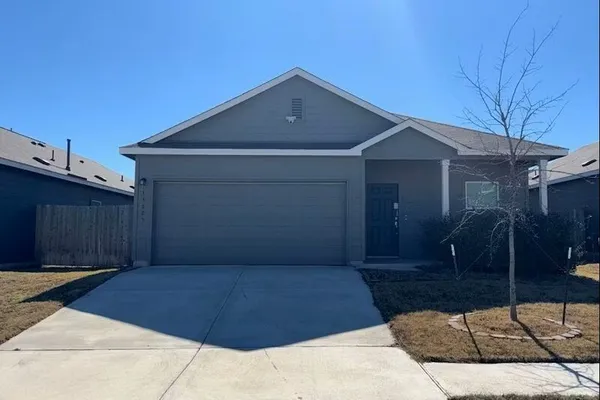 a house view with a outdoor space