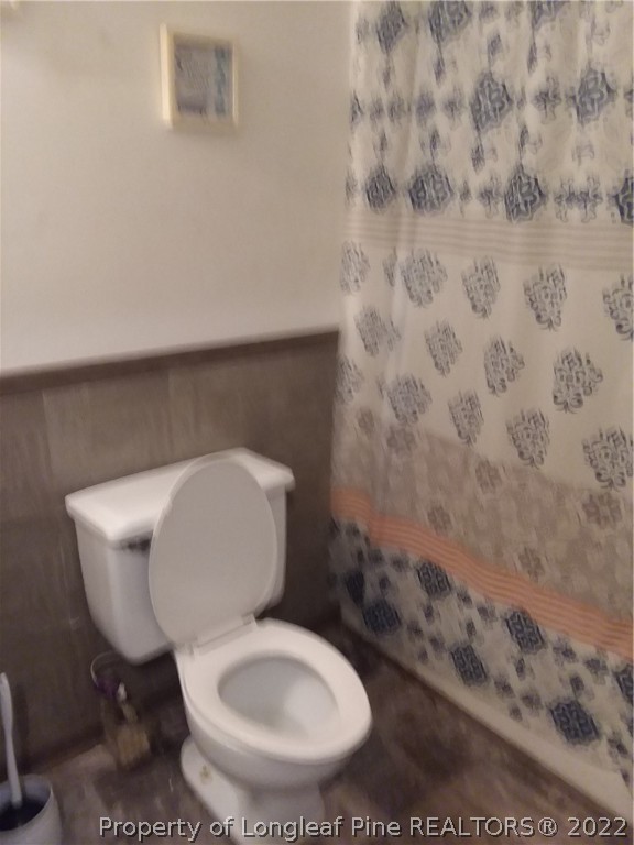 2560 Graham Road Fayetteville, NC 28304 - Photo 11 of 13 a bathroom with a toilet and a sink