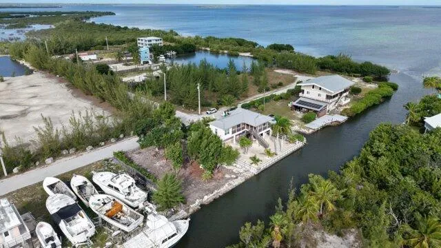 an aerial view of lake residential house with outdoor space