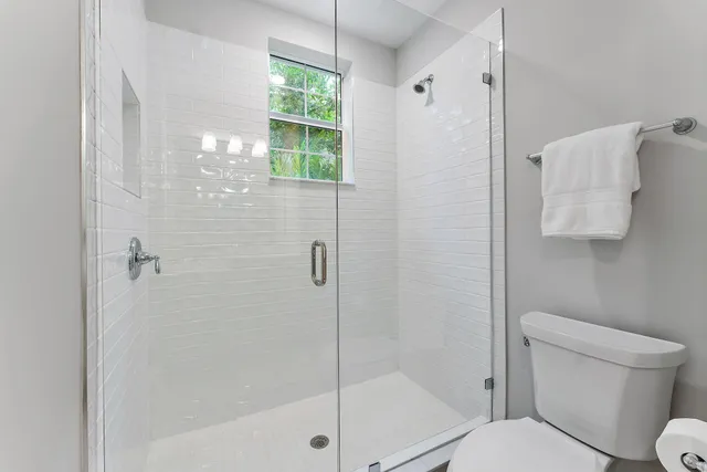 a view of staircase with lots of frames and windows