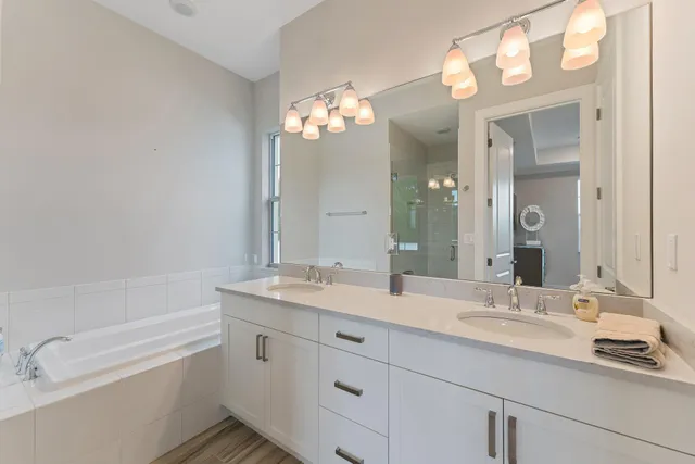 a view of a balcony with two chairs and a table