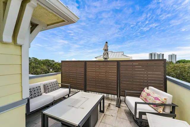 a view of a swimming pool with a terrace