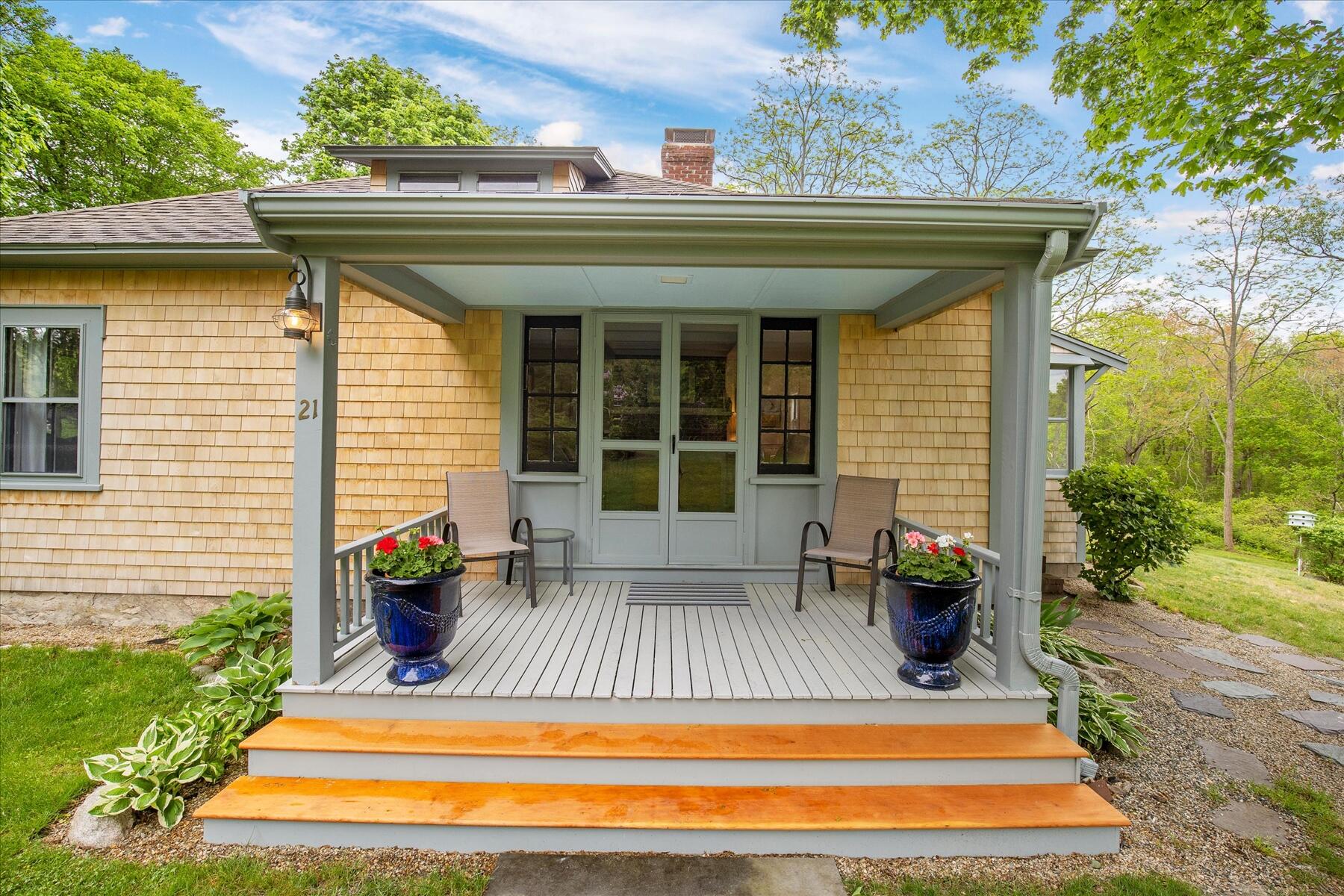 21 Quaker Road East Sandwich, MA 02537 - Photo 3 of 43 a view of house with outdoor seating space