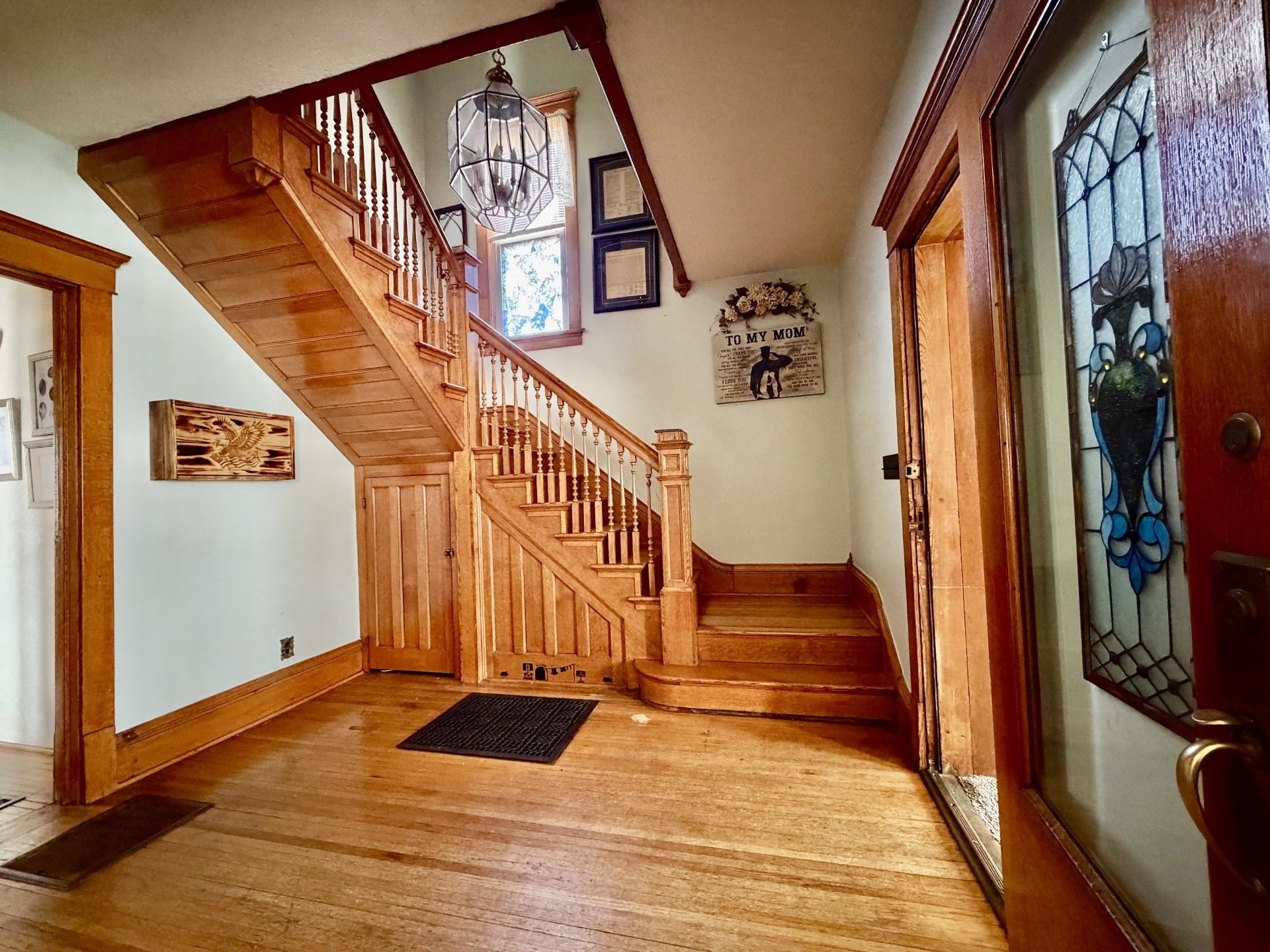 31 3rd Street Savanna, IL 61074 - Photo 12 of 42 a view of staircase with white walls and a window