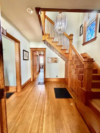 a view of a hallway view with staircase