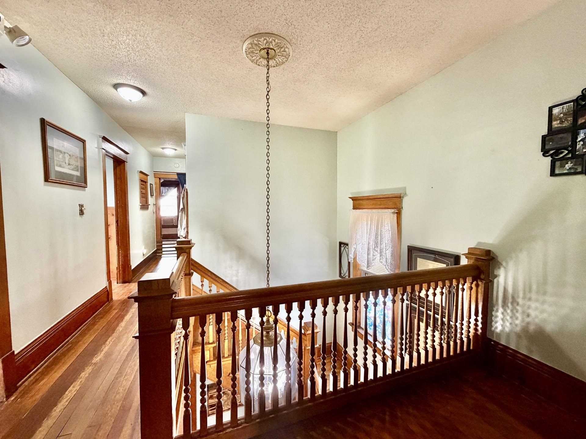 31 3rd Street Savanna, IL 61074 - Photo 37 of 42 a view of a hallway view with staircase