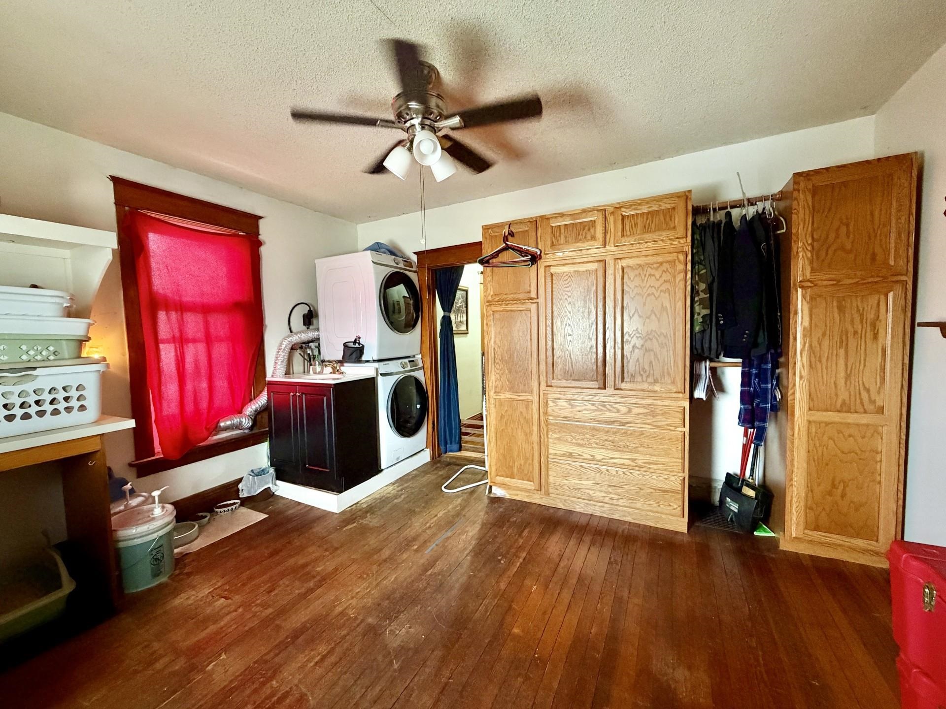 31 3rd Street Savanna, IL 61074 - Photo 39 of 42 a room with furniture closet and flat screen tv
