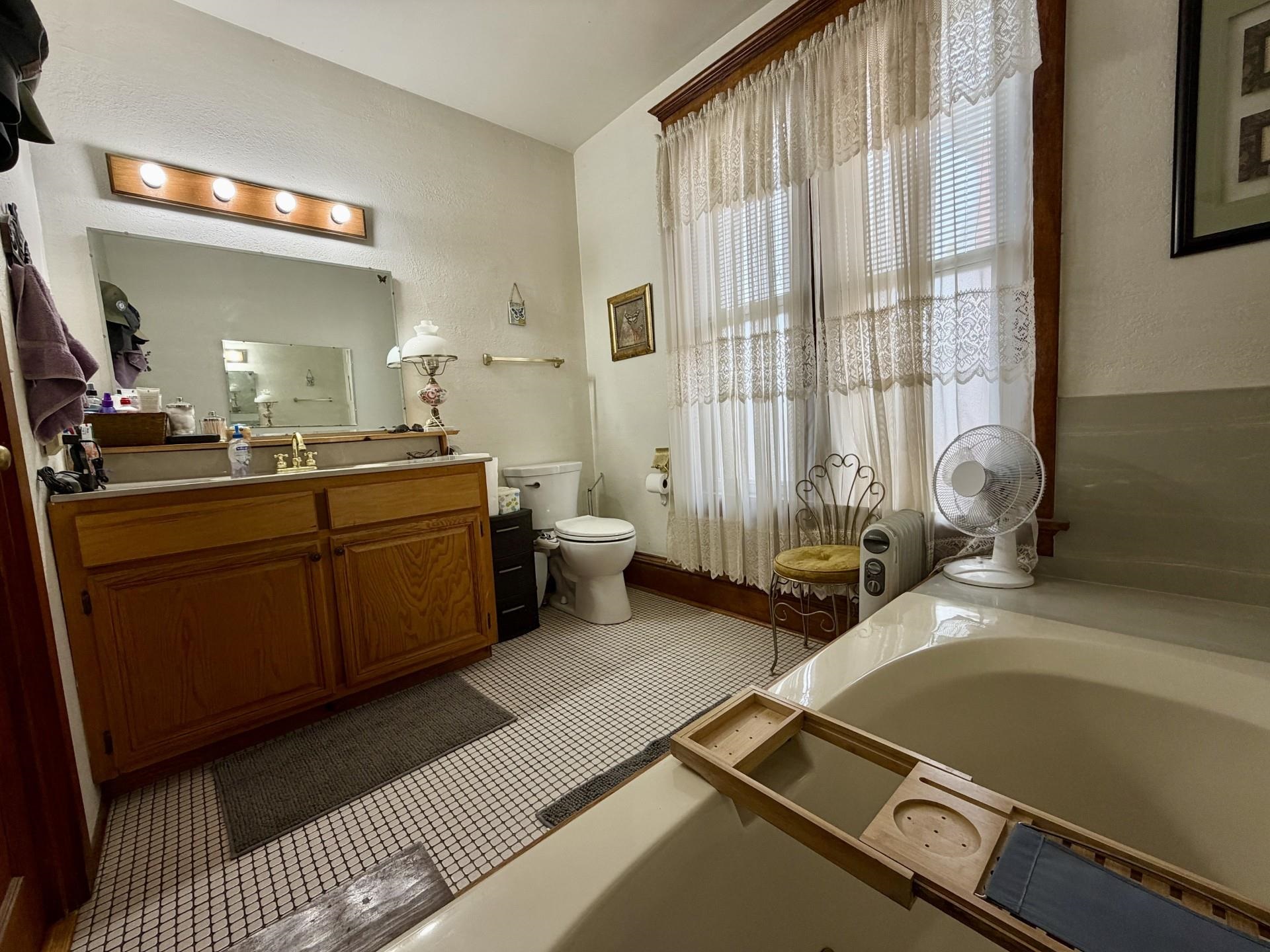 31 3rd Street Savanna, IL 61074 - Photo 8 of 42 a room with a washing machine and sink