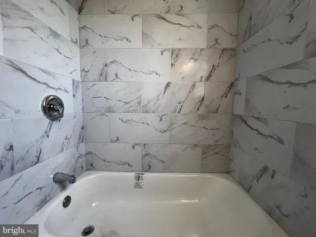 a bathroom with a bathtub