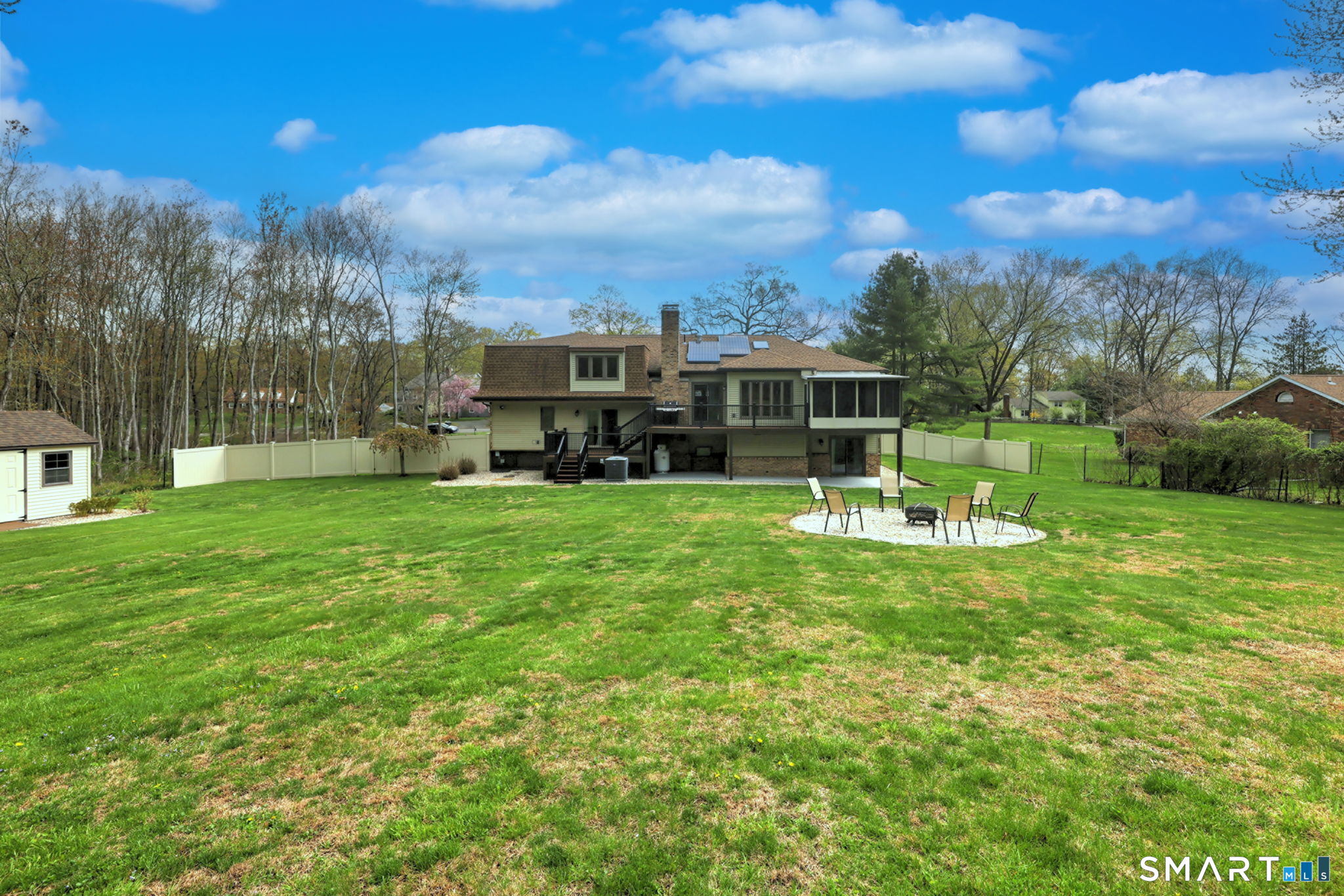 2262 Ridge Road North Haven, CT 06473 - Photo 19 of 40 a view of a house with a big yard and a large tree