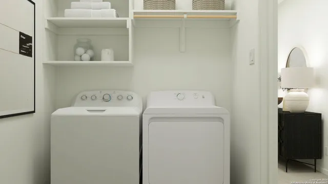 a utility room with dryer and washer