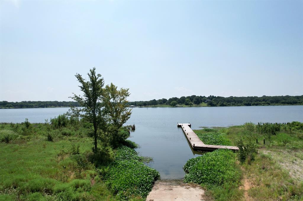 Lot 15 Anglers Point Drive Emory, TX 75440 - Photo 12 of 17 a lake view with a garden