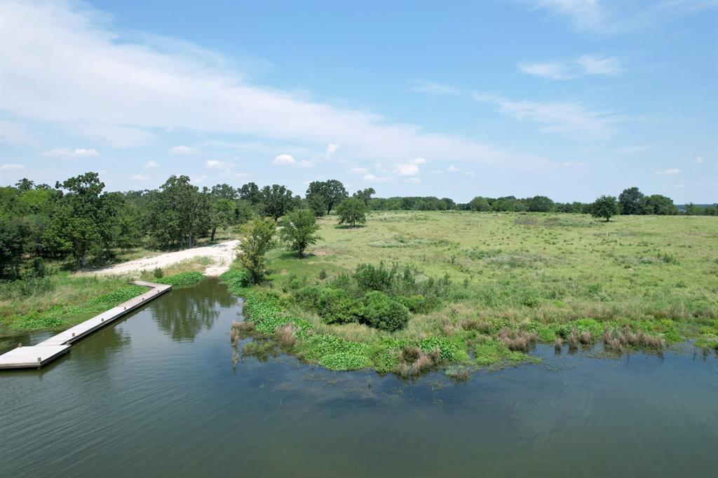 Lot 15 Anglers Point Drive Emory, TX 75440 - Photo 13 of 17 a view of a lake with a city