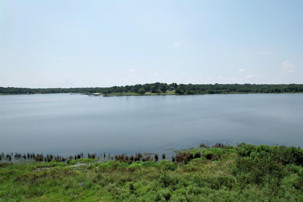 Lot 15 Anglers Point Drive Emory, TX 75440 - Photo 9 of 17 a view of a lake with houses in the back