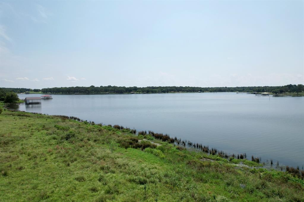 Lot 15 Anglers Point Drive Emory, TX 75440 - Photo 10 of 17 a view of a lake with a big yard