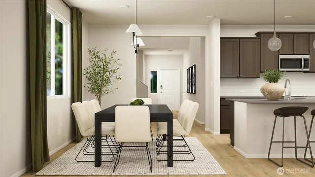 a dining room with furniture and window